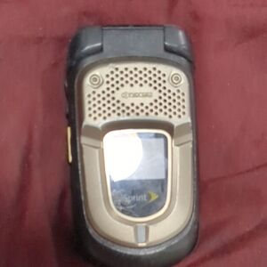 Kyocera Flip Phone with Gold and Black Design